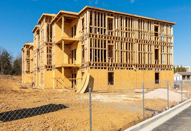 a snapshot of temporary chain link fences protecting a large construction project from unauthorized access in Georgetown, CT